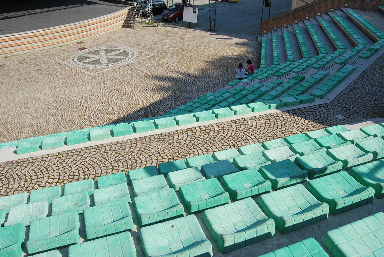 Green (Lega Nord color) chairs's stall and the Sun of the Alp symbol at the Giuseppe Verdi theater.